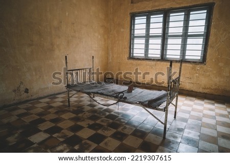 Prison Cell of S21 notorious torture prison by the khmer rouge at Phnom Penh on Cambodia. instruments of torture of the Khmer Rouge.
