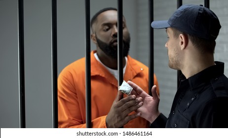 Prison Guard Giving Afroamerican Imprisoned Male Stock Photo 1486461164 ...