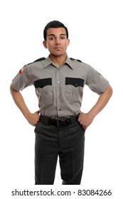 Prison Guard, Warden, Or Cop Standing Firm With Hands On Hip