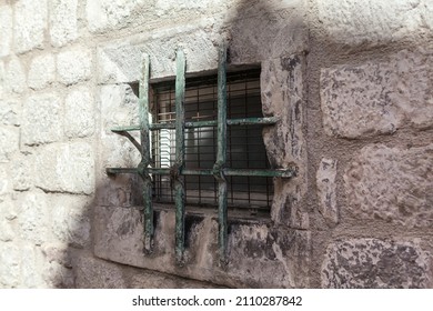 Prison Window . Window With Grates And Brick Wall