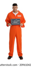 Prisoner In Orange Jumpsuit With Mugshot Letter Board On White Background