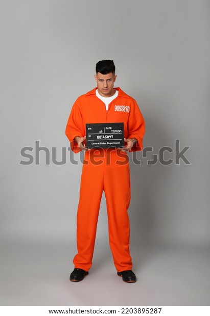 Prisoner Orange Jumpsuit Mugshot Letter Board Stock Photo 2203895287 ...