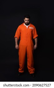 Prisoner In Special Jumpsuit On Black Background