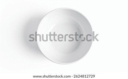 A pristine, empty, white oval ceramic bowl sits on a stark white background. The overhead shot showcases its smooth, simple design and clean lines. Perfect for food photography.