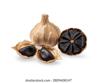Pristine minimalist composition of fermented black garlic heads and individual peeled cloves, showcasing premium healthy ingredients on white