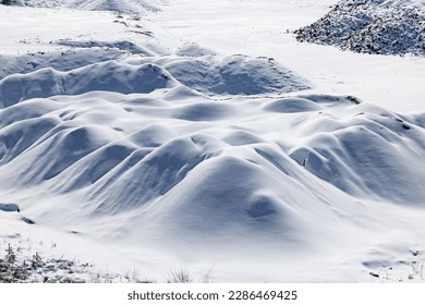 Pristine untouched snow on rolling hills - Shutterstock ID 2286469425