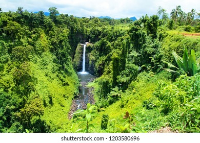 Pristine Waterfalls In The Middle Of Tropical Jungle Of Upolu Island, Sopoaga Falls In Samoa, Polynesia Central Pacific Ocean