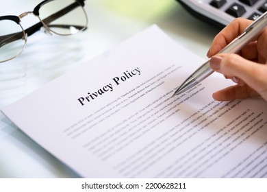 Privacy Policy Notice And Legal Agreement. Woman Reading Contract