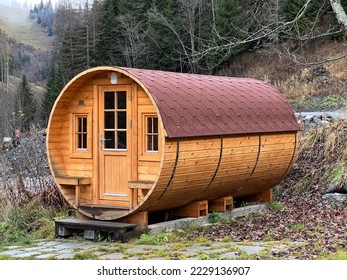 A private accommodation unit in the form of a large wooden barrel or a glamping bungalow in a barrel - the Calfeisental valley and in the UNESCO World Heritage Tectonic Arena Sardona, Switzerland