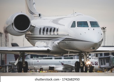 Private Business Jet Airplane On The Runway Waiting To Take Off