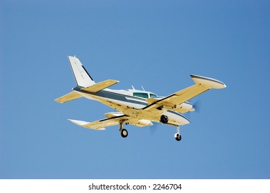 Private dual engine aircraft flies overhead - Powered by Shutterstock
