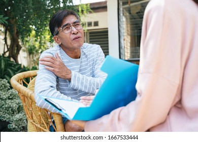 Private Duty Nurse Explain The Result Of Observation For Her Old Patient In The Backyard Of His House.