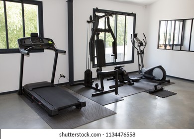 Private Gym At Home Interior With Different Sport Exercise Equipment