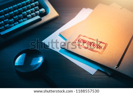 Private investigator desk with confidential envelopes