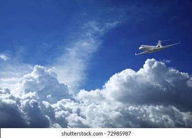 Private Jet Aircraft In A Blue Sky