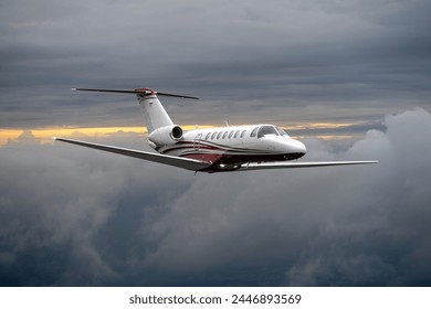 Private jet flies high above the clouds - Powered by Shutterstock