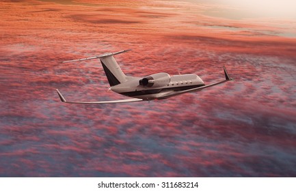 Private Jet Flying Over A Sunset Sky