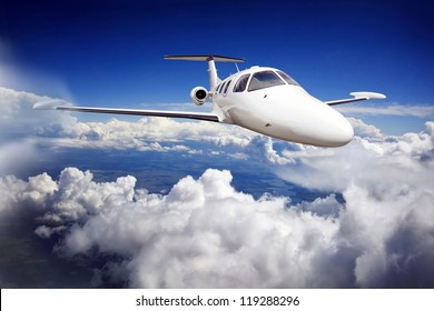 Private Jet Plane In The Blue Sky