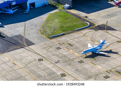 Private Jet Ready To Fly On The Airport Runway, Aerial View.