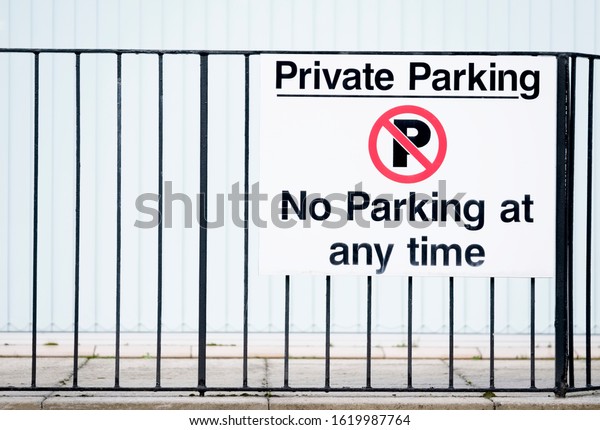 Private land no parking\
sign