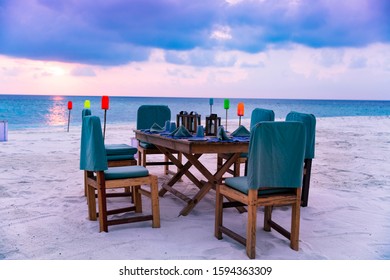 Private Luxury Dining Experience On Pristine Tropical Beach At Sunset