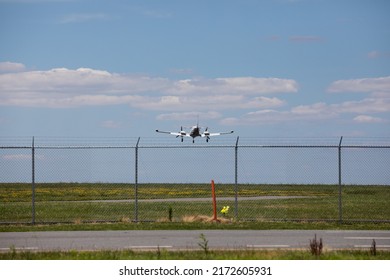 Private Plane Landing On Beautiful Summer Day