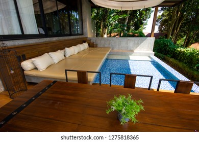 Private poolside seating in luxurious accommodation
