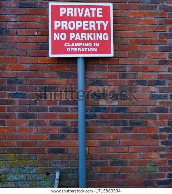 Private property clamp sign. Do not park.\
Private land. Clamping in\
operation.