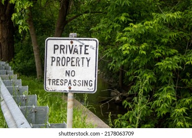 private property no trespassing black and white sign