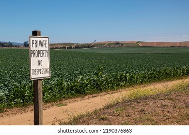 Private Property no trespassing sign on farm land
