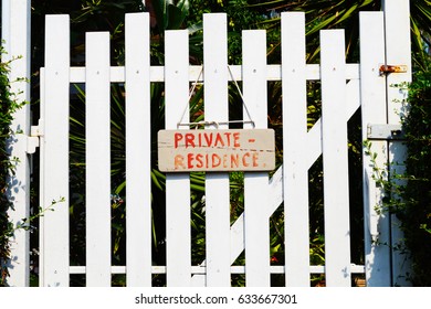 Private residence sign. Private property sign on the fence. White fence. Nameplate. - Shutterstock ID 633667301