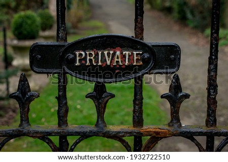  Private Sign on Metal Gate Background
