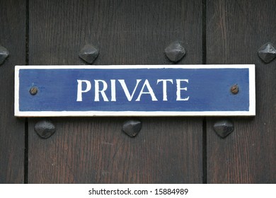 Private Sign On An Old Wooden Door