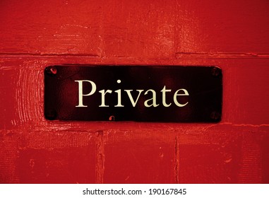 Private Sign On Red Door 