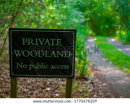 Private woodland sign in the woods. No public access