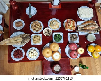 A prize with food dedicated to ancestors. The turn is the traditional Korean culture of preparing food on the morning of a holiday and bowing down to ancestors. - Shutterstock ID 2256792115