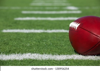 Pro American Football On The Field Near The Yard Lines