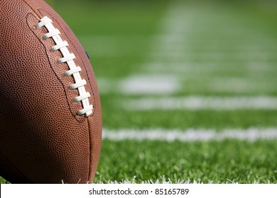 Pro American Football On The Field Close Up With Room For Copy, Shot At Shallow Depth Of Field