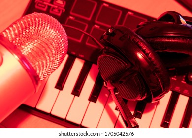 Pro Audio Equipment. Synth Midi Piano Keyboard, Condenser Microphone And Headphones. Stuff For Making Music Or Podcast Equipment