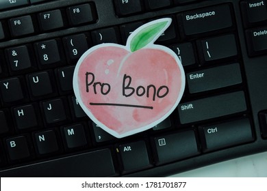 Pro Bono text on sticky notes isolated on office desk.