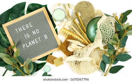 Pro environment letter board concept with There is No Planet B message and environmentally friendly zero waste shopping bag with household products.