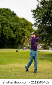 Pro Golfer Practicing His Swing