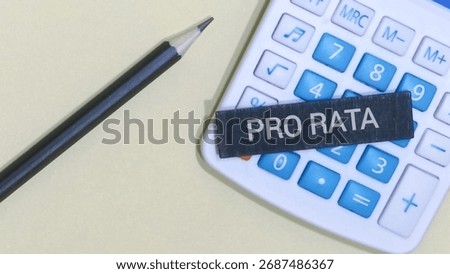 A pro rata concept for fair allocation and proportional distribution using a pencil and calculator, ideal for illustrating financial or investment concepts and scenarios.