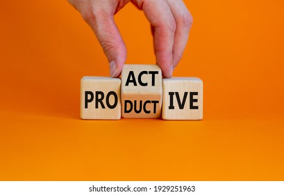 Proactive and productive symbol. Businessman turns cubes and changes the word 'productive' to 'proactive'. Beautiful orange background, copy space. Business, proactive and productive concept. - Shutterstock ID 1929251963