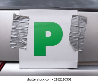 Probationary Plate (P Plates) On The Back Of A Car, Attached With Duct Tape