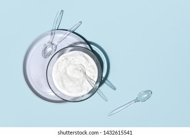 Probiotic Or Conventional Plain Low Fat Yogurt In Glass Bowl, Top Down View, Blank Space For A Text