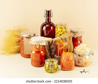 Probiotic Food. Pickled Or Fermented Products. Fermented Vegetables And Mushrooms In Glass Jars, Bottle With Home Made Beer. Home Food Preserving Or Canning. Preserving The Harvest