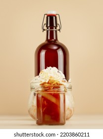 Probiotic Food. Pickled Or Fermented Vegetables. Sauerkraut, Lecho In Glass Jars And Bottle Of Home Made Beer On Light Background. Home Food Preserving Or Canning. Autumn Food And Oktoberfest Concept