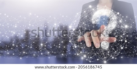 Problem, need of help and advice concept. Hand touch digital screen hologram question mark sign on city light blurred background. FAQ Concept image.Find answer online