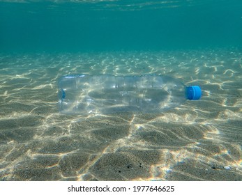 The Problem Of Plastic Pollution Of Sea Water, Plastic Bottles Under Water, Fish Suffering From Plastic In The Ocean, An Environmental Problem In The Sea, Waste Plastic Bottles